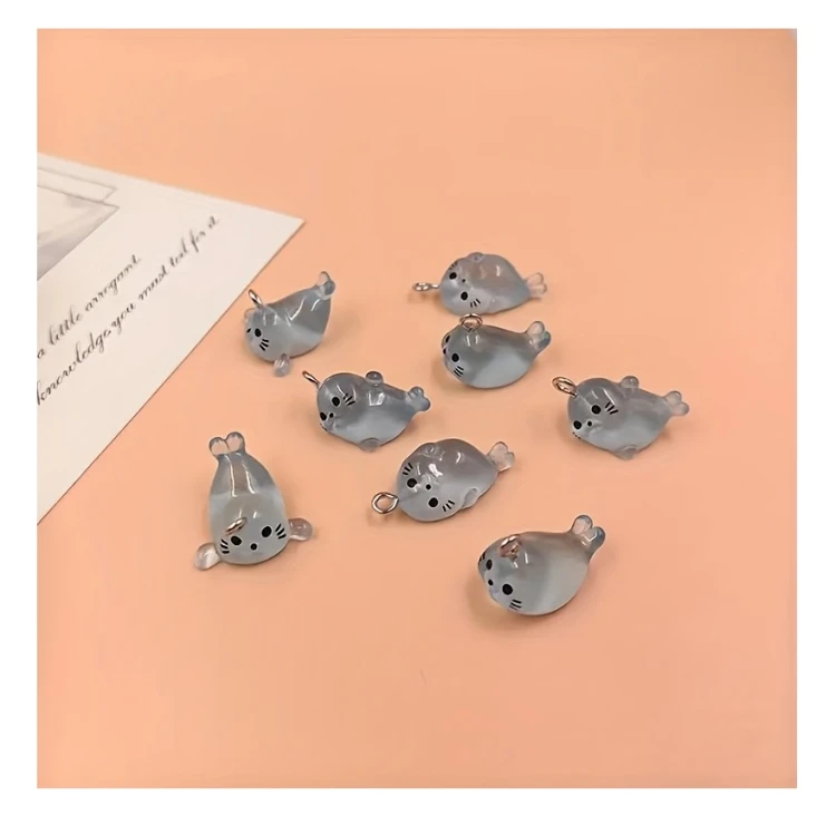 Zawieszka żywiczna Charms Foki świecące w ciemności Kawaii 4 sztuki