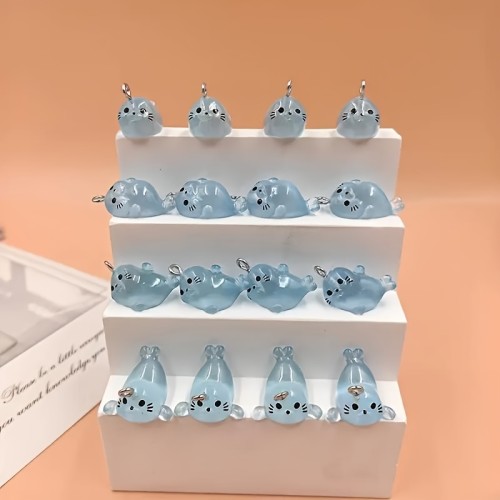 Zawieszka żywiczna Charms Foki świecące w ciemności Kawaii 4 sztuki