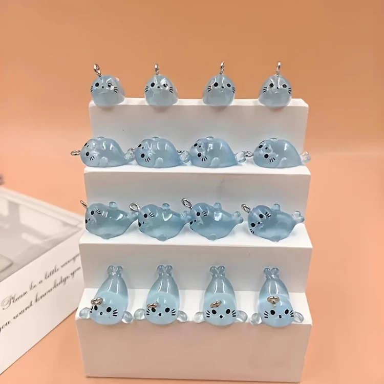 Zawieszka żywiczna Charms Foki świecące w ciemności Kawaii 4 sztuki