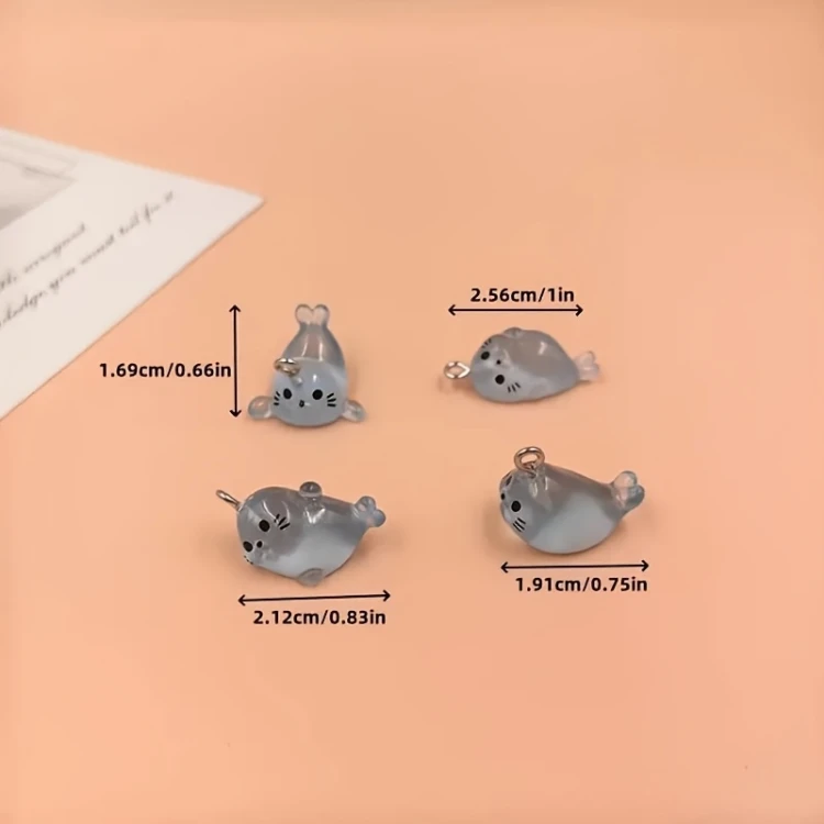 Zawieszka żywiczna Charms Foki świecące w ciemności Kawaii 4 sztuki