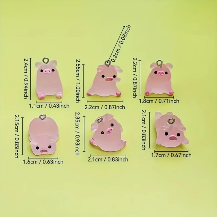 Zawieszka żywiczna Charms Świnki świecące w ciemności MIX wzorów 5 sztuk