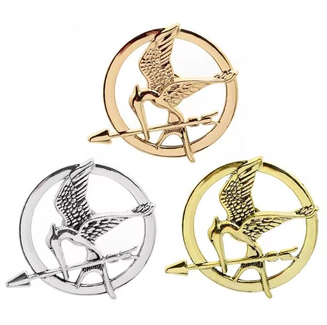 Przypinka emaliowana metalowa PIN Kosogłos Mockingjay Igrzyska Śmierci sreb